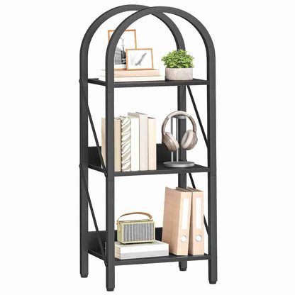 Black metal bookshelf with books, a plant, and other items on a white background