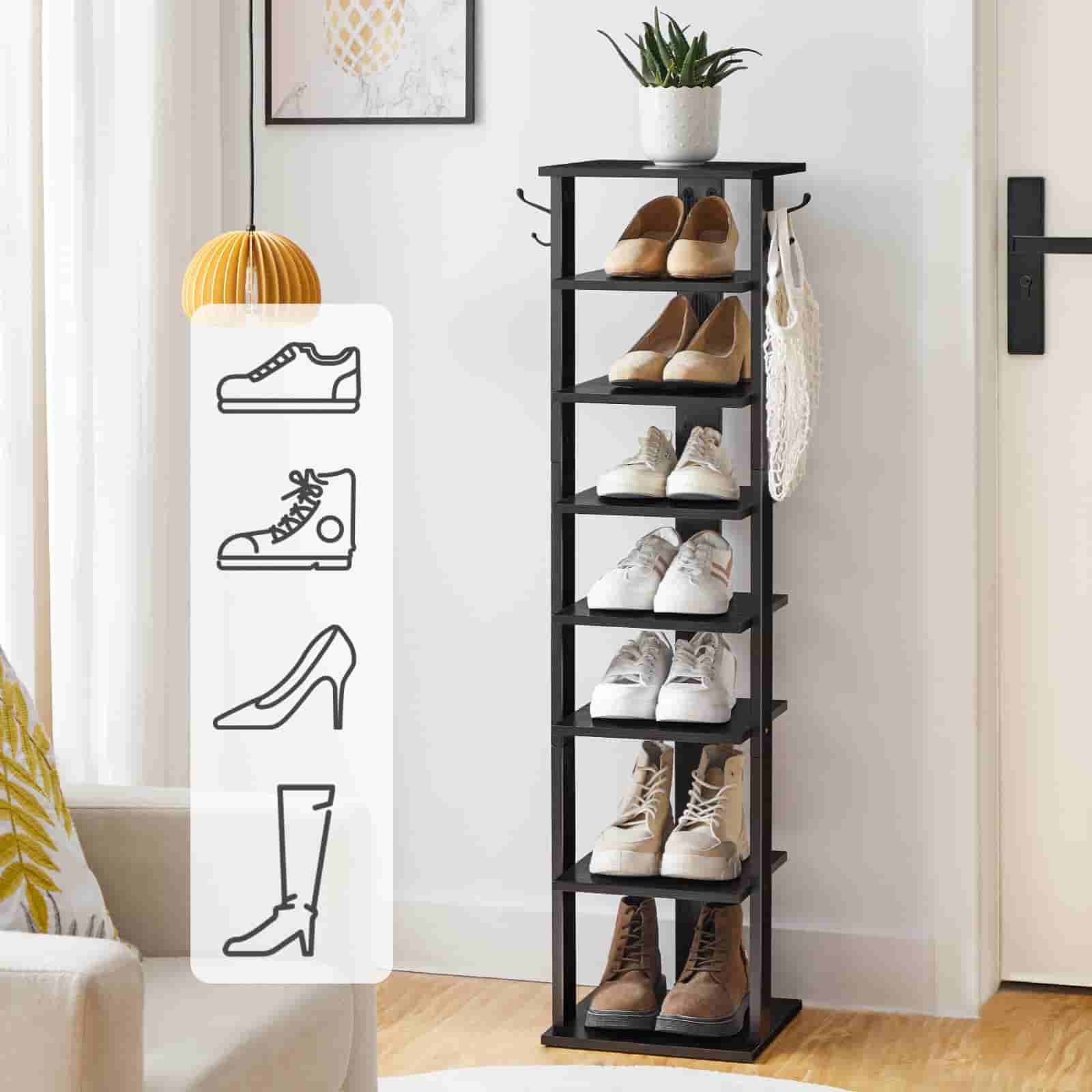 Black shoe rack with various shoes on shelves in a room setting.