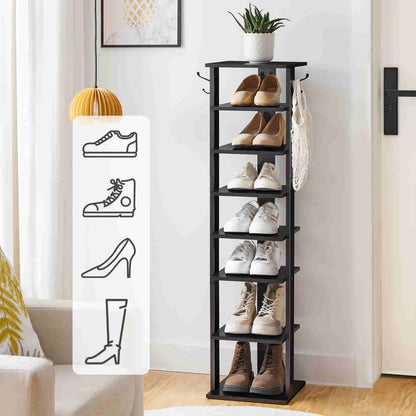 Black shoe rack with various shoes on shelves in a room setting.