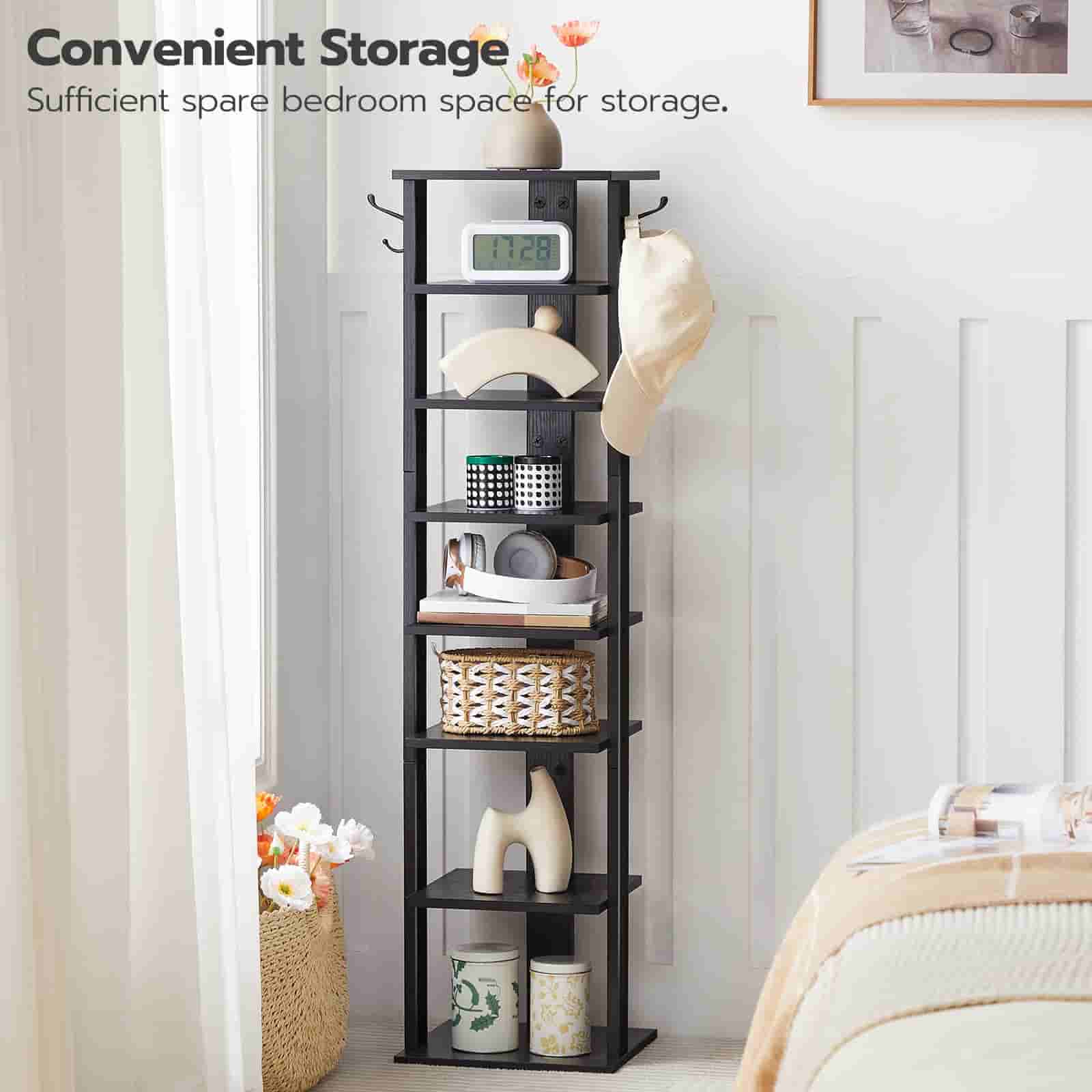 Tall black storage shelf in a bedroom with various items on shelves.
