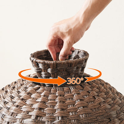 Hand interacting with a woven basket, emphasizing its 360-degree design.
