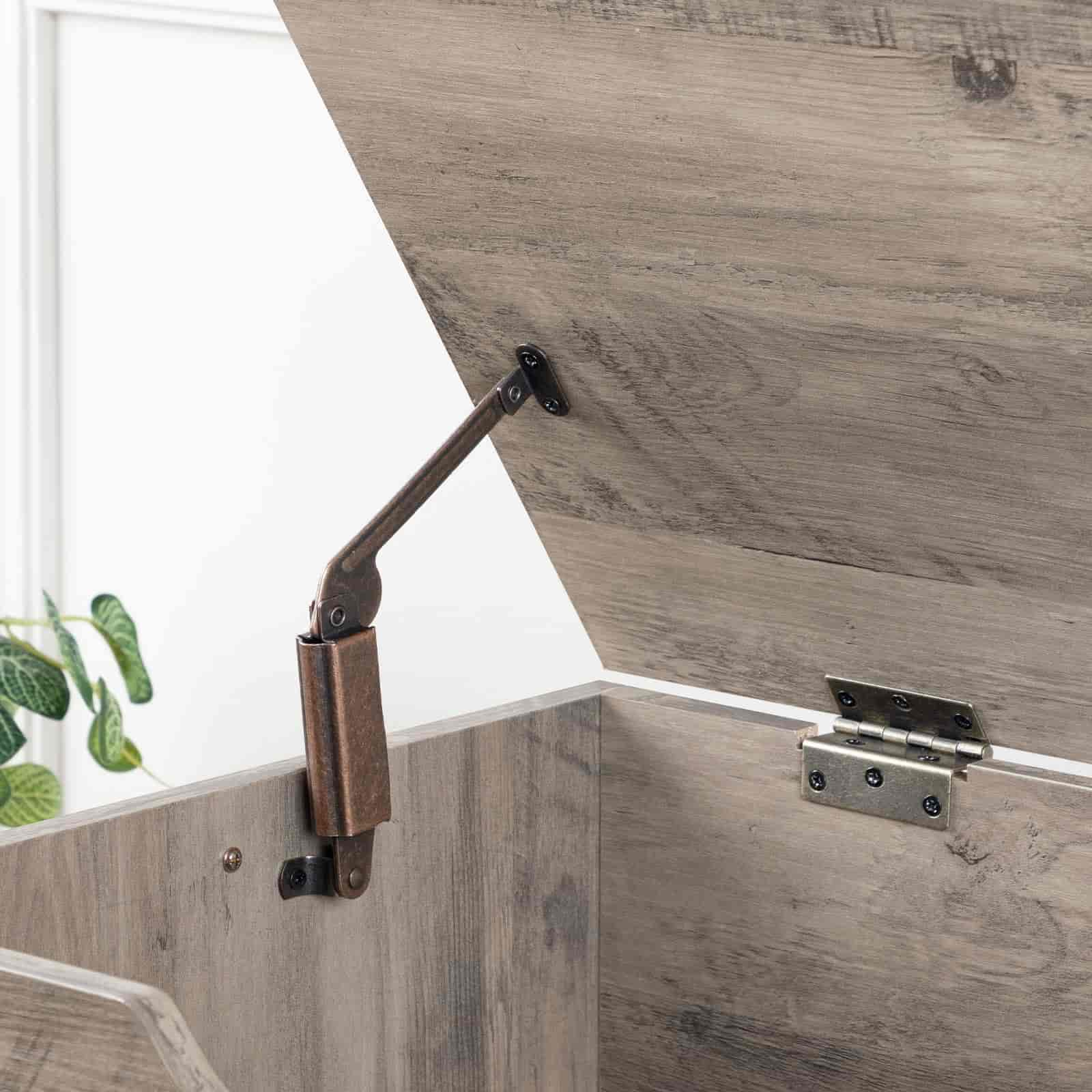 Wooden panel with a metal bracket and hinge on a white background