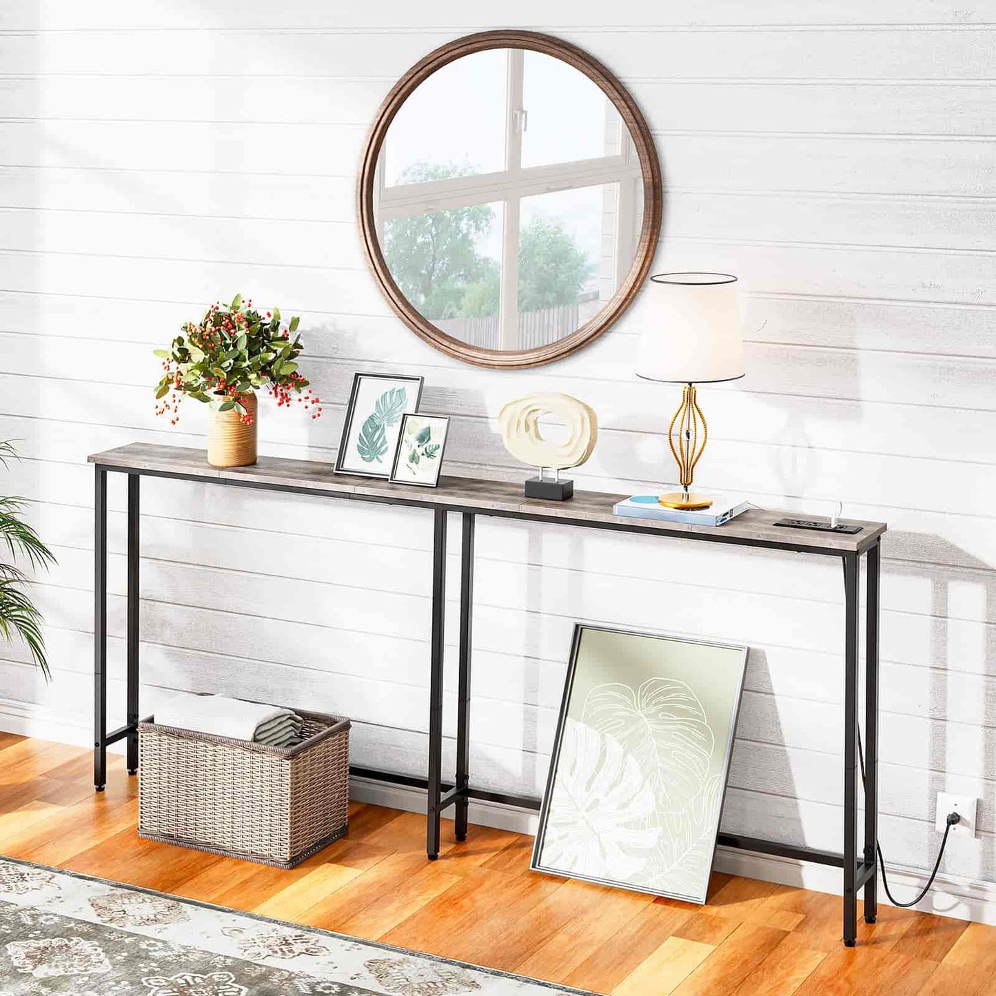 Console table with decorative items against a white wall