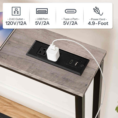 Desk with power outlet and plug, showing electrical specifications.