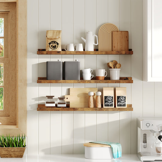 Wooden shelves with kitchen items against a white wall