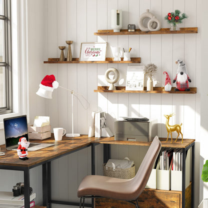 Home office with wooden desk, chair, and shelves decorated with festive items.