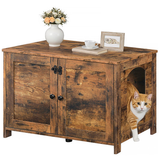 Wooden cabinet with a cat peeking out, decorative items on top, on a white background