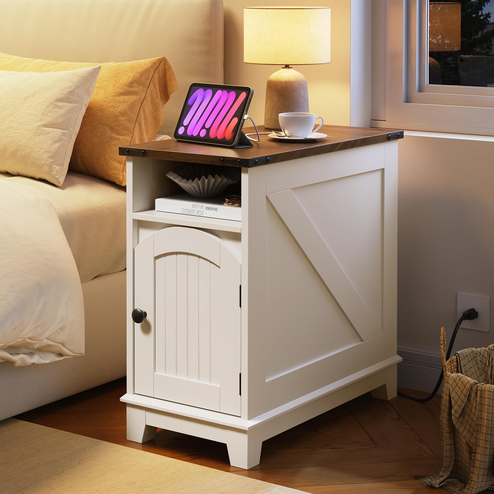 White nightstand with wooden top in a bedroom setting