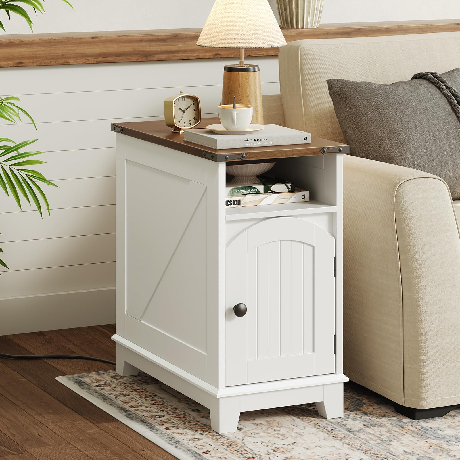 White side table with wooden top next to a beige sofa in a living room setting.