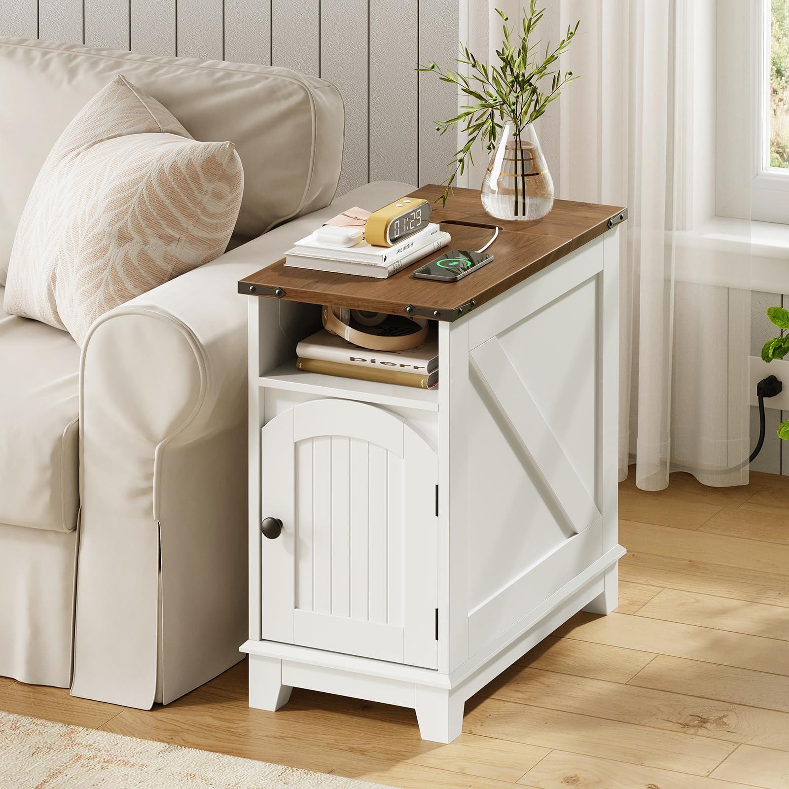 White side table with wooden top next to a beige sofa in a living room.