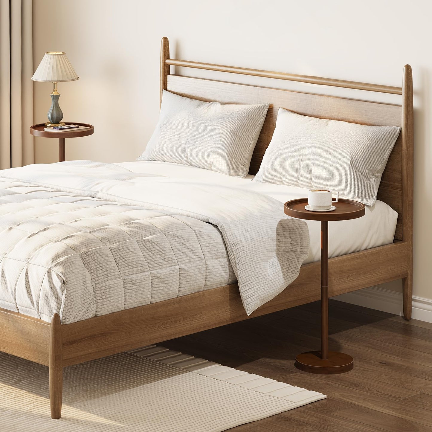 Wooden bed with white bedding and pillows in a room setting.