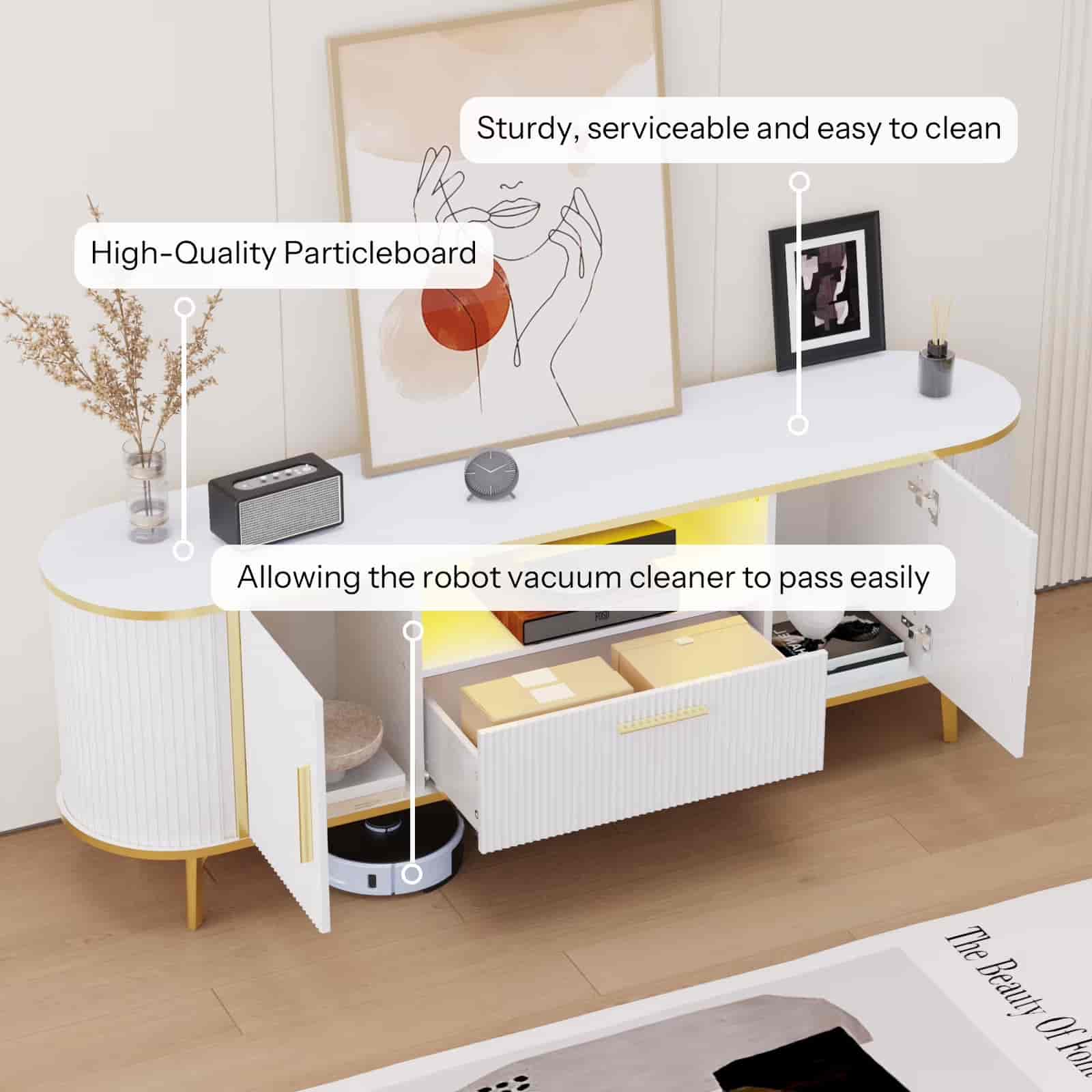 White entertainment console with open doors, robot vacuum cleaner, and text highlighting features.