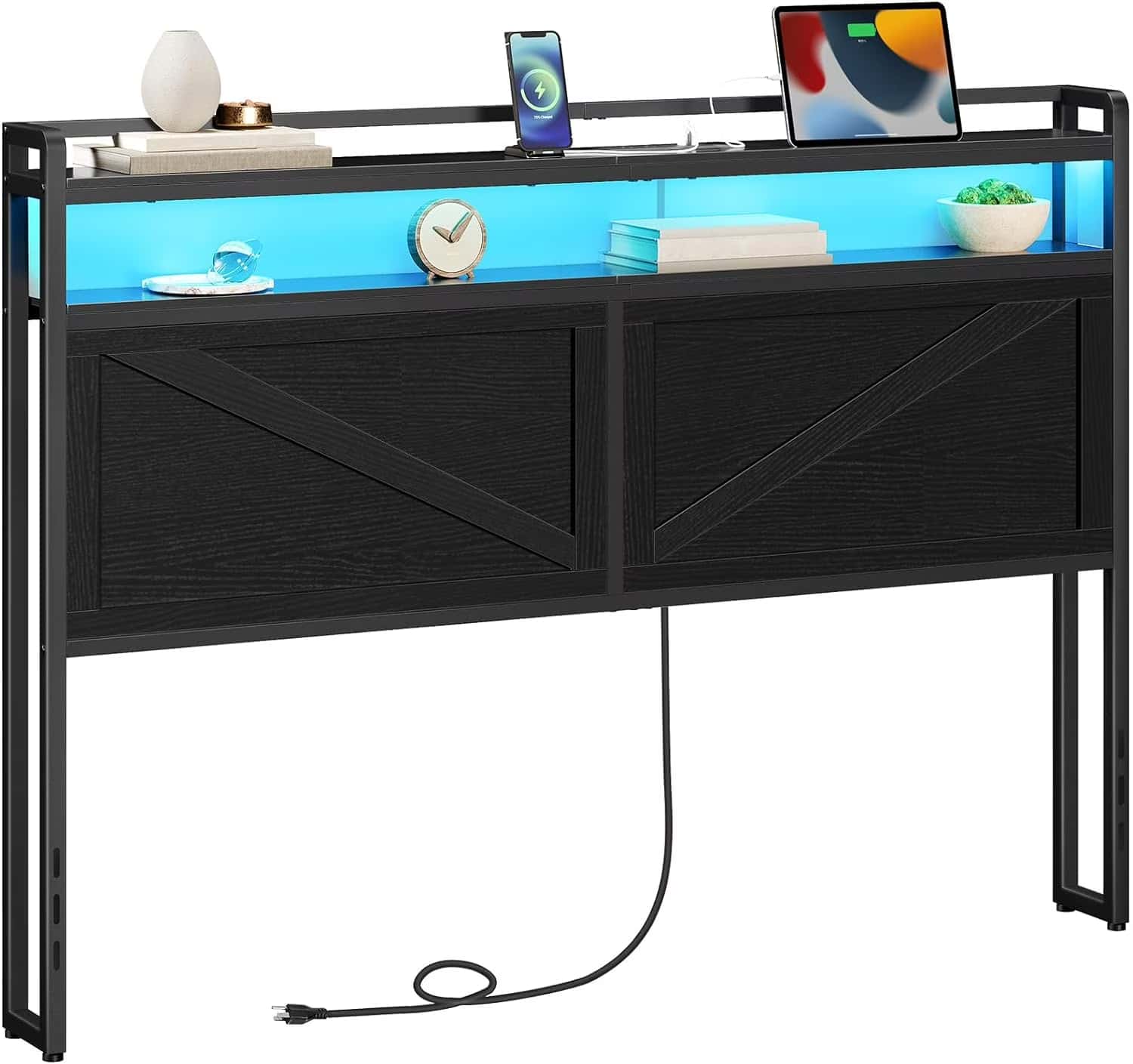 Black desk with LED lighting on top, displaying various items.
