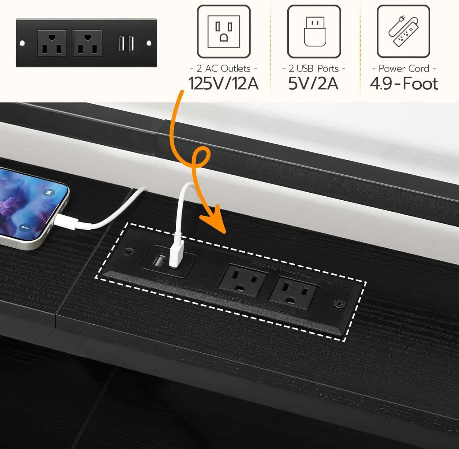 Desk with power outlet and USB ports, showing a phone charging cable.
