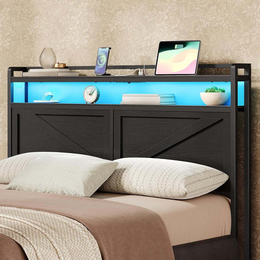 Bed with a black headboard featuring a built-in desk and LED lighting.