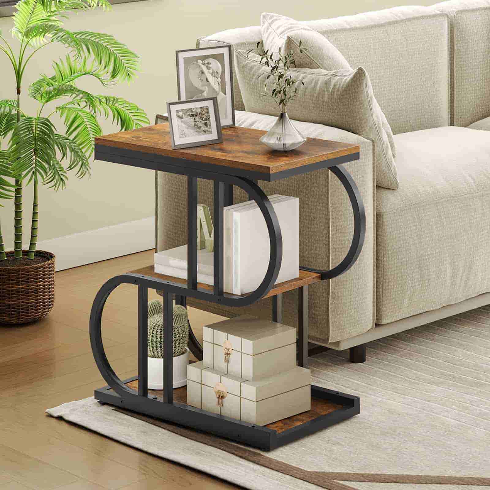 Wooden side table with black metal frame in a living room setting.