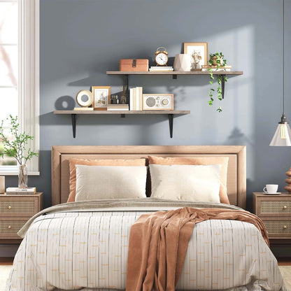 Bedroom with wooden bed, shelves with decor items, and a cup on a small table.