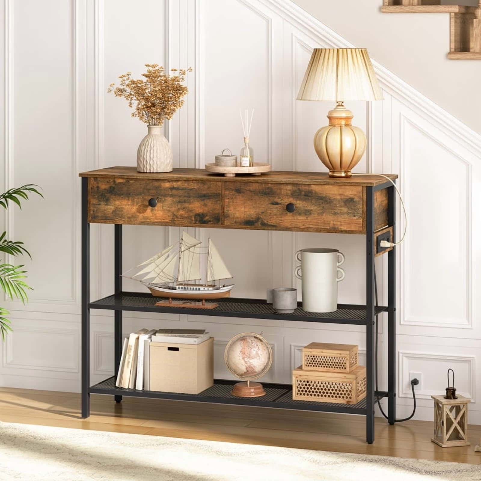 Wooden console table with decorative items in a room setting