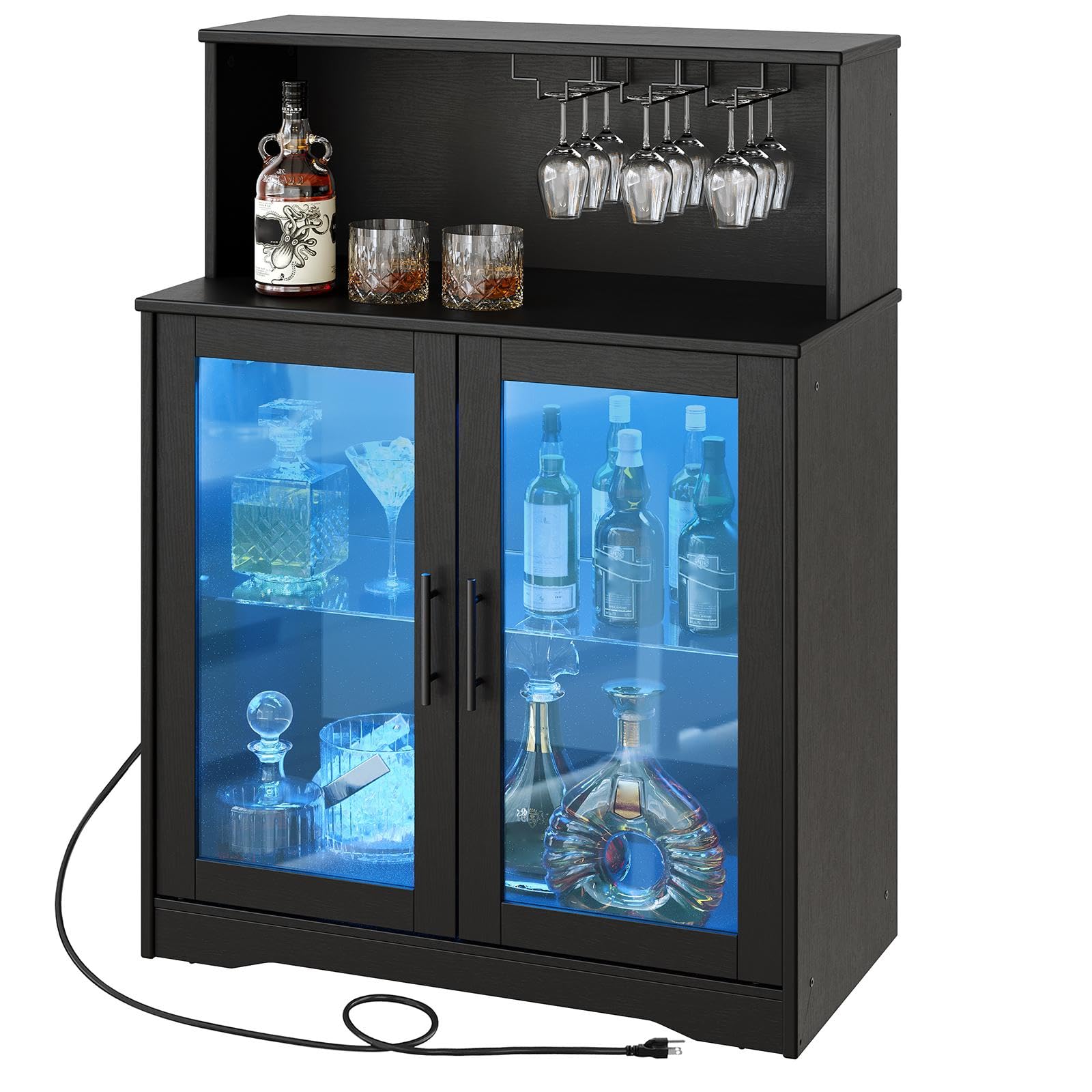 Black bar cabinet with illuminated glass doors displaying bottles and glasses on a white background
