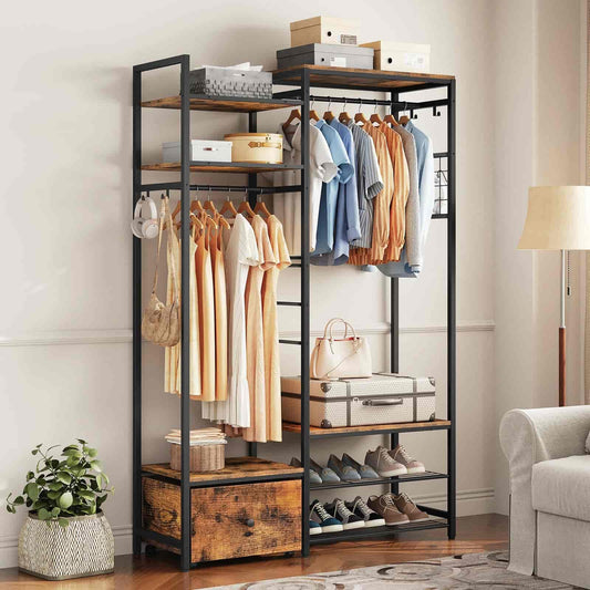 Clothing rack with clothes, shoes, and bags in a room setting.