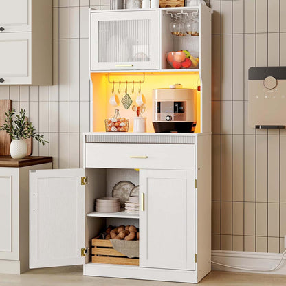 White kitchen cabinet with open doors displaying various items in a kitchen setting.
