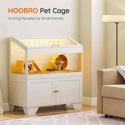 HOOBRO pet cage in a living room setting with a couch and lamp.