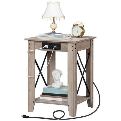 Wooden side table with charging ports, lamp, clock, and books on a white background