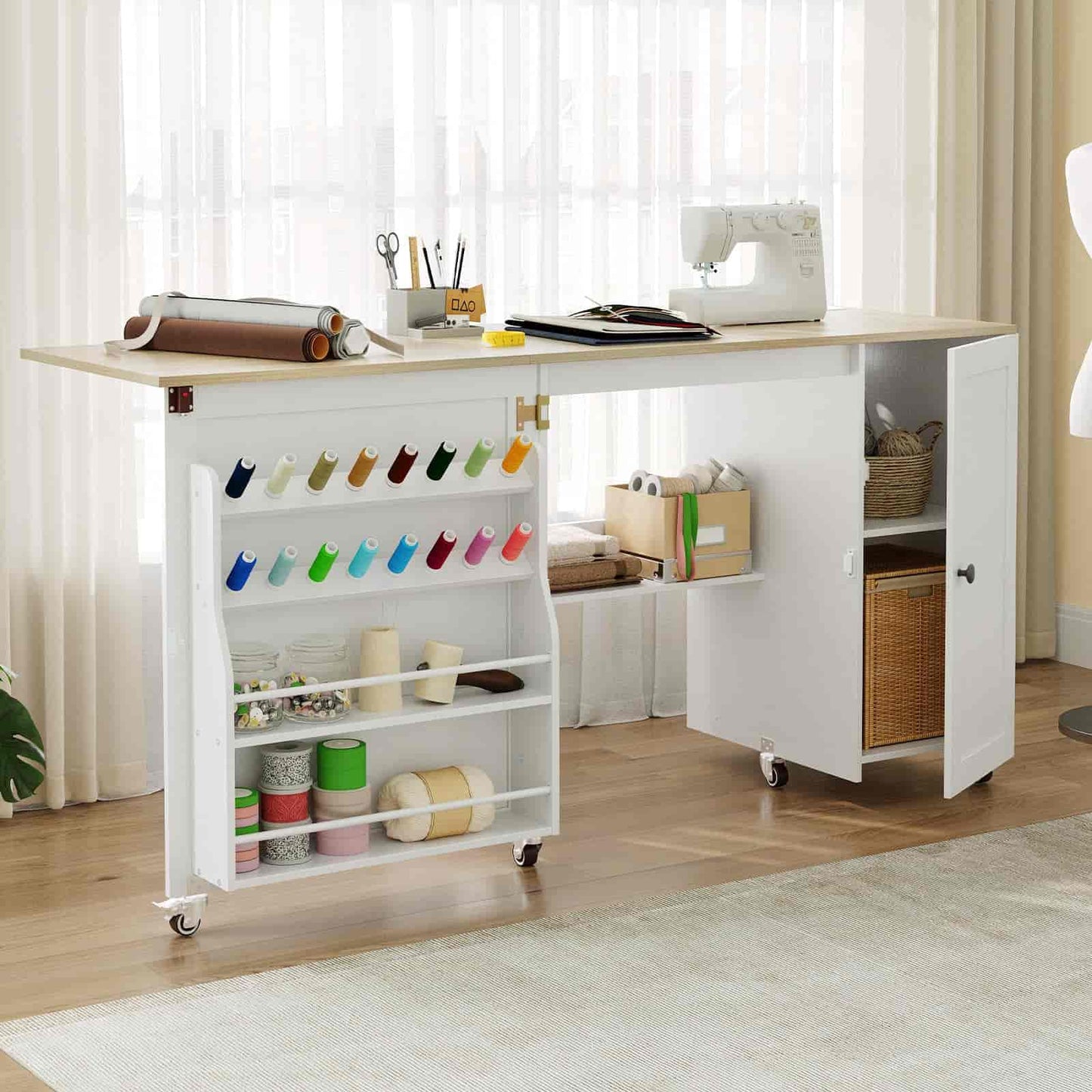 White sewing table with shelves and a sewing machine in a room with curtains and a rug.