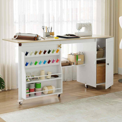 White sewing table with shelves and a sewing machine in a room with curtains and a rug.