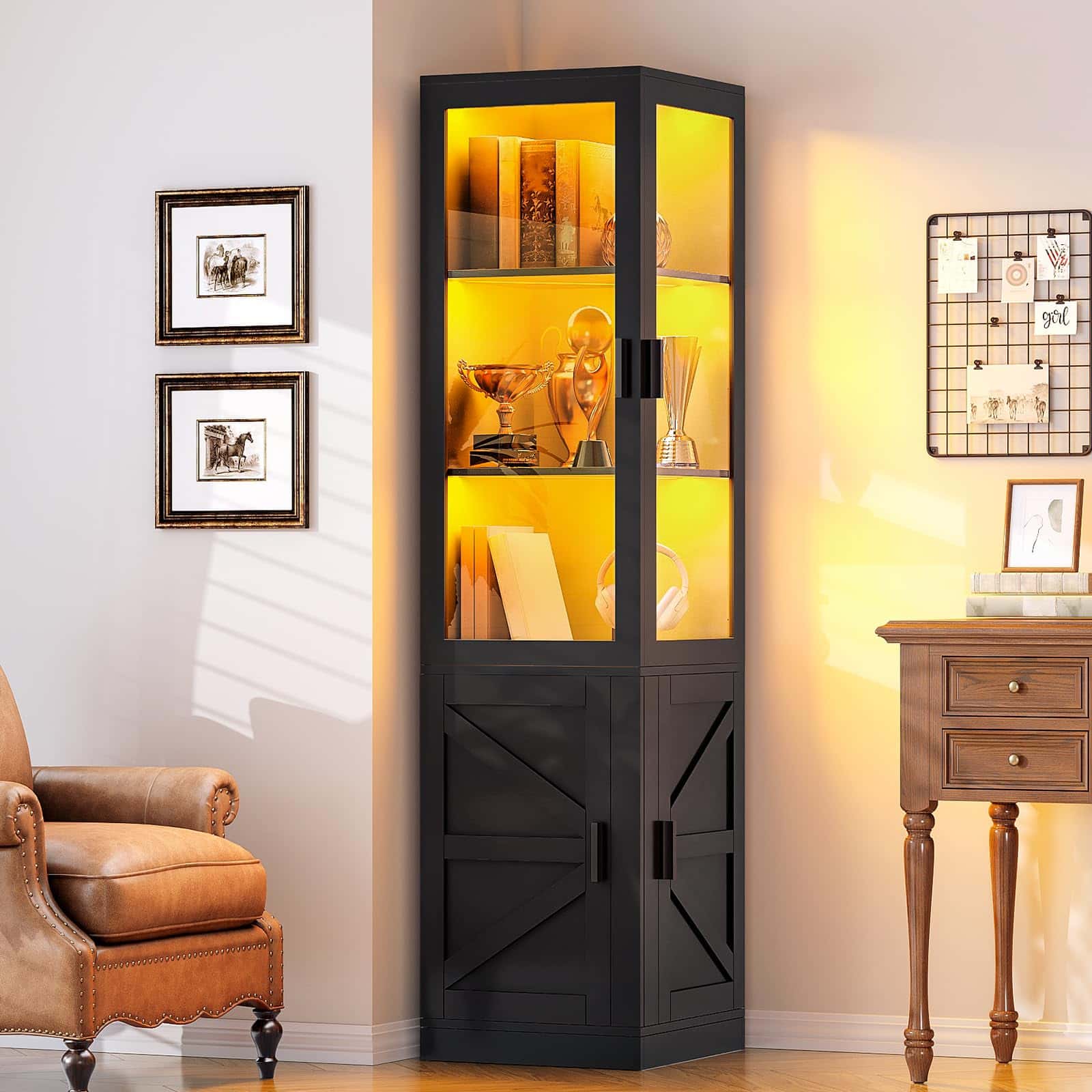 Tall black corner cabinet with glass doors in a room with a chair and table.
