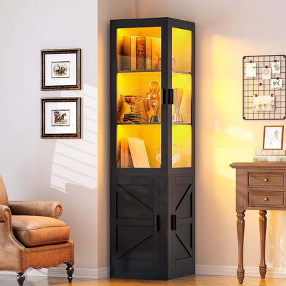 Tall black corner cabinet with glass doors in a room with a chair and table.