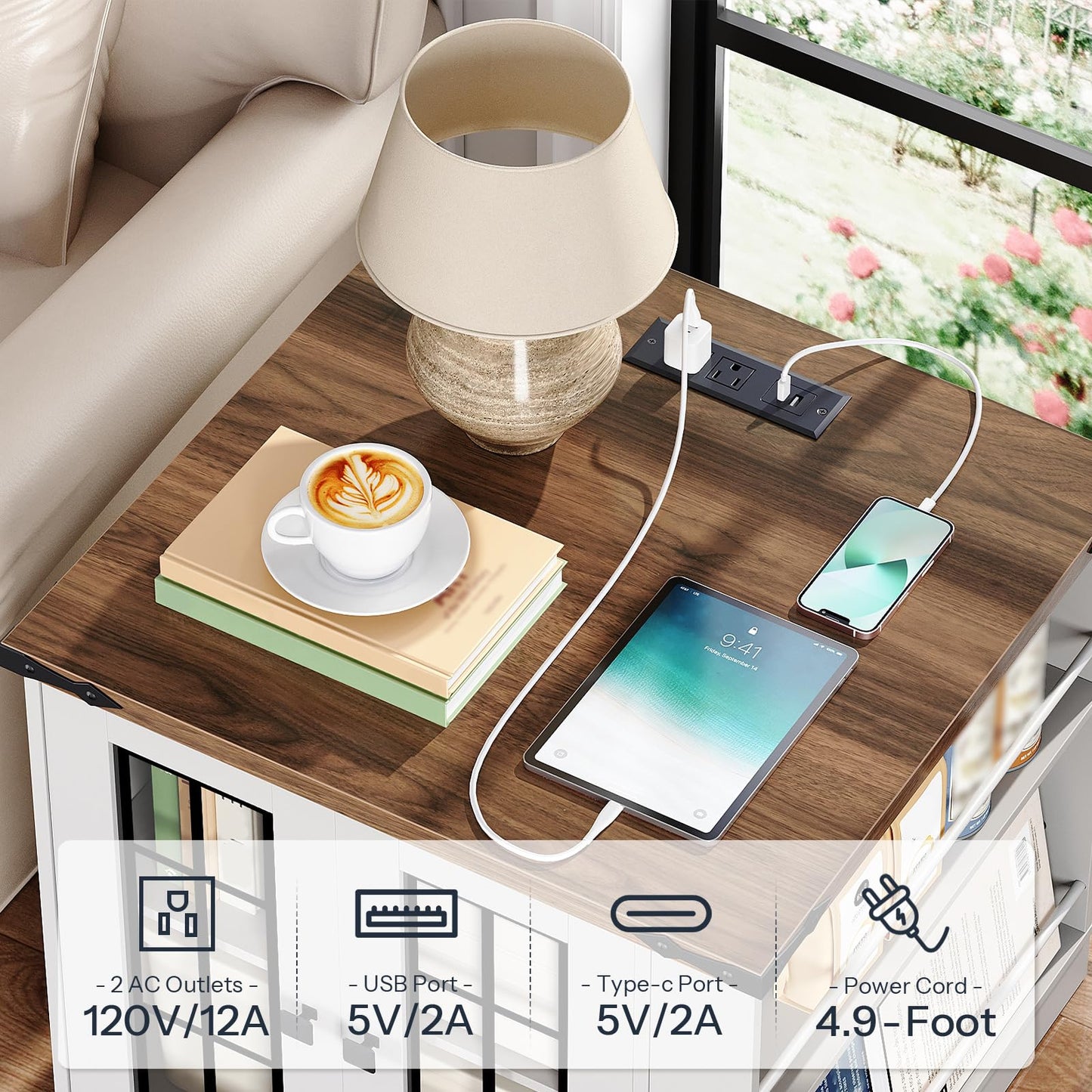 Wooden side table with electronic devices and a lamp, featuring power outlets and cables.