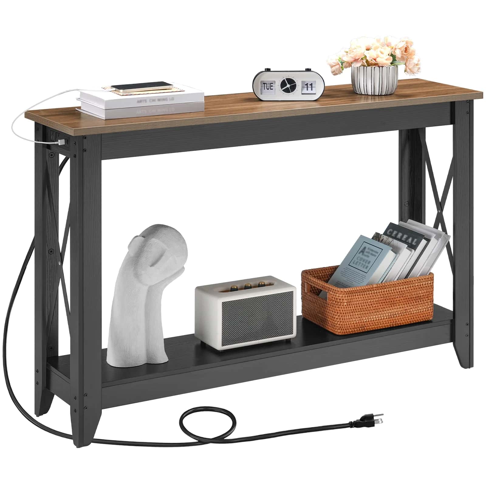 Console table with wooden top and black metal base, featuring decorative items.