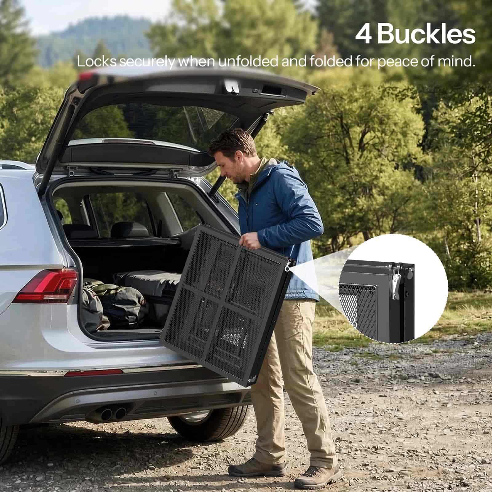 Man opening a car trunk with a black cargo organizer, surrounded by trees.