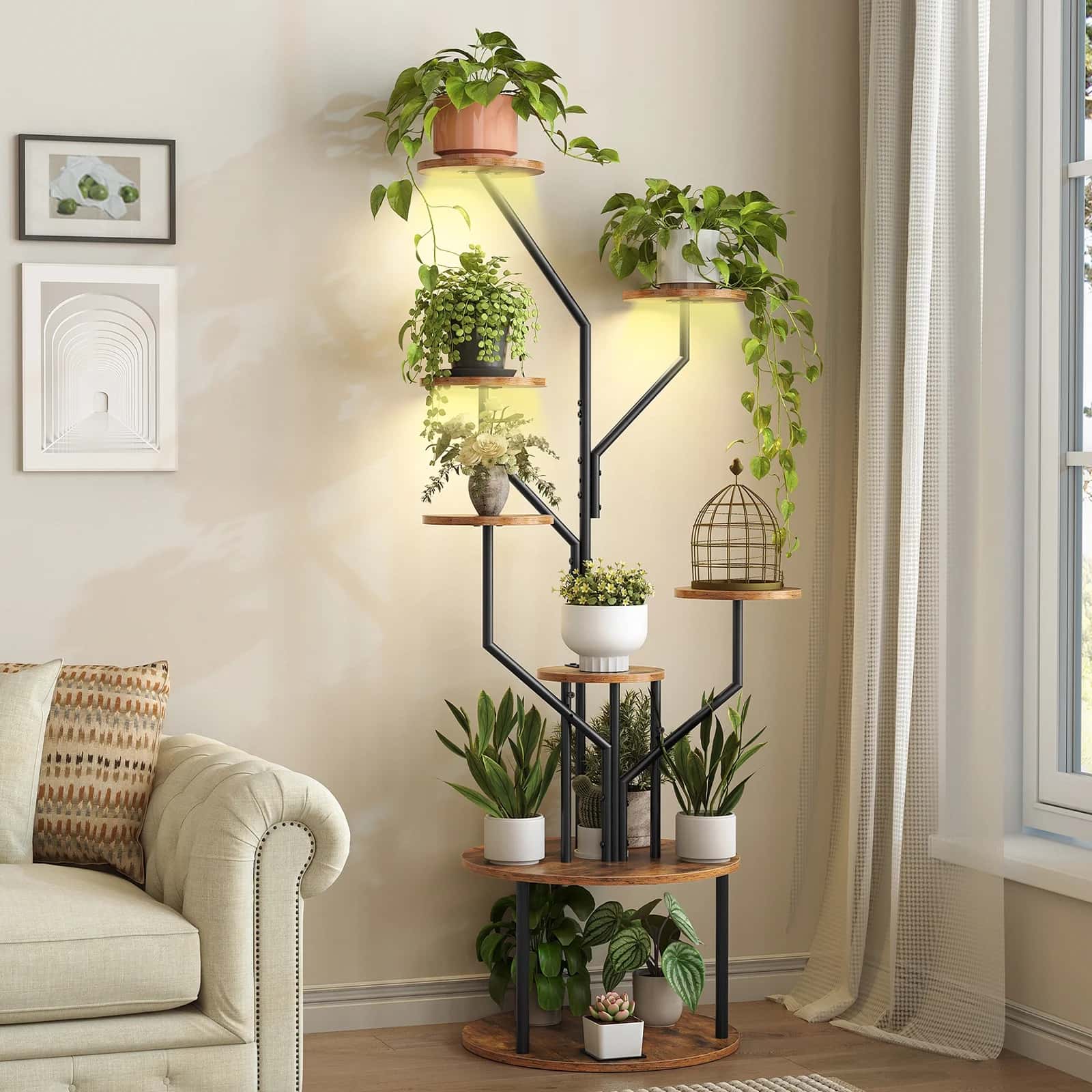 Decorative indoor plant stand with multiple shelves holding potted plants in a living room setting.