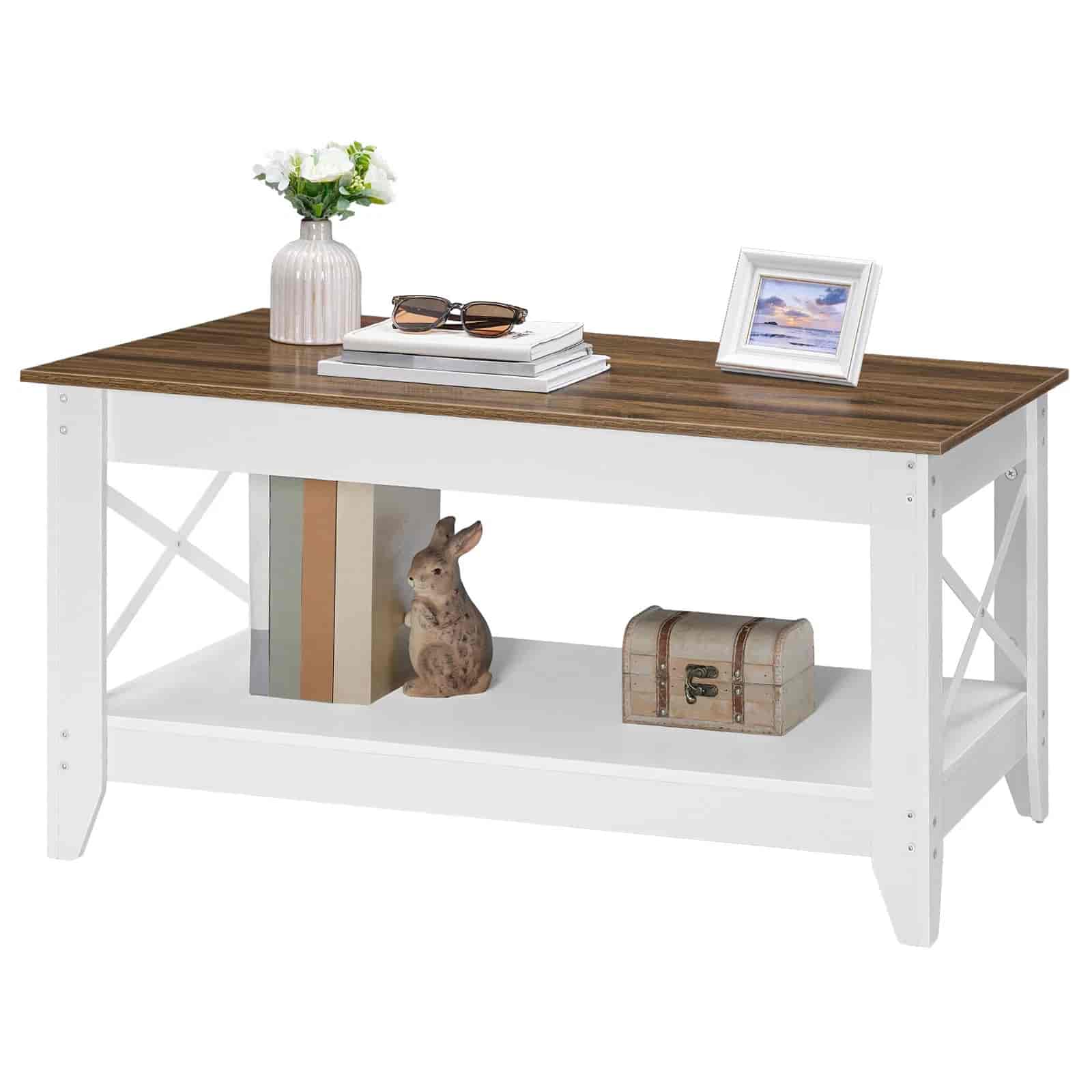 Wooden table with decorative items on a white background
