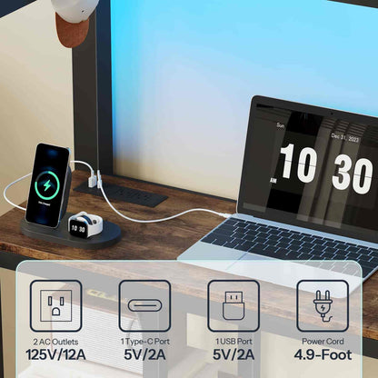 Laptop, phone, and earbuds charging on a desk with power outlet and cable display.