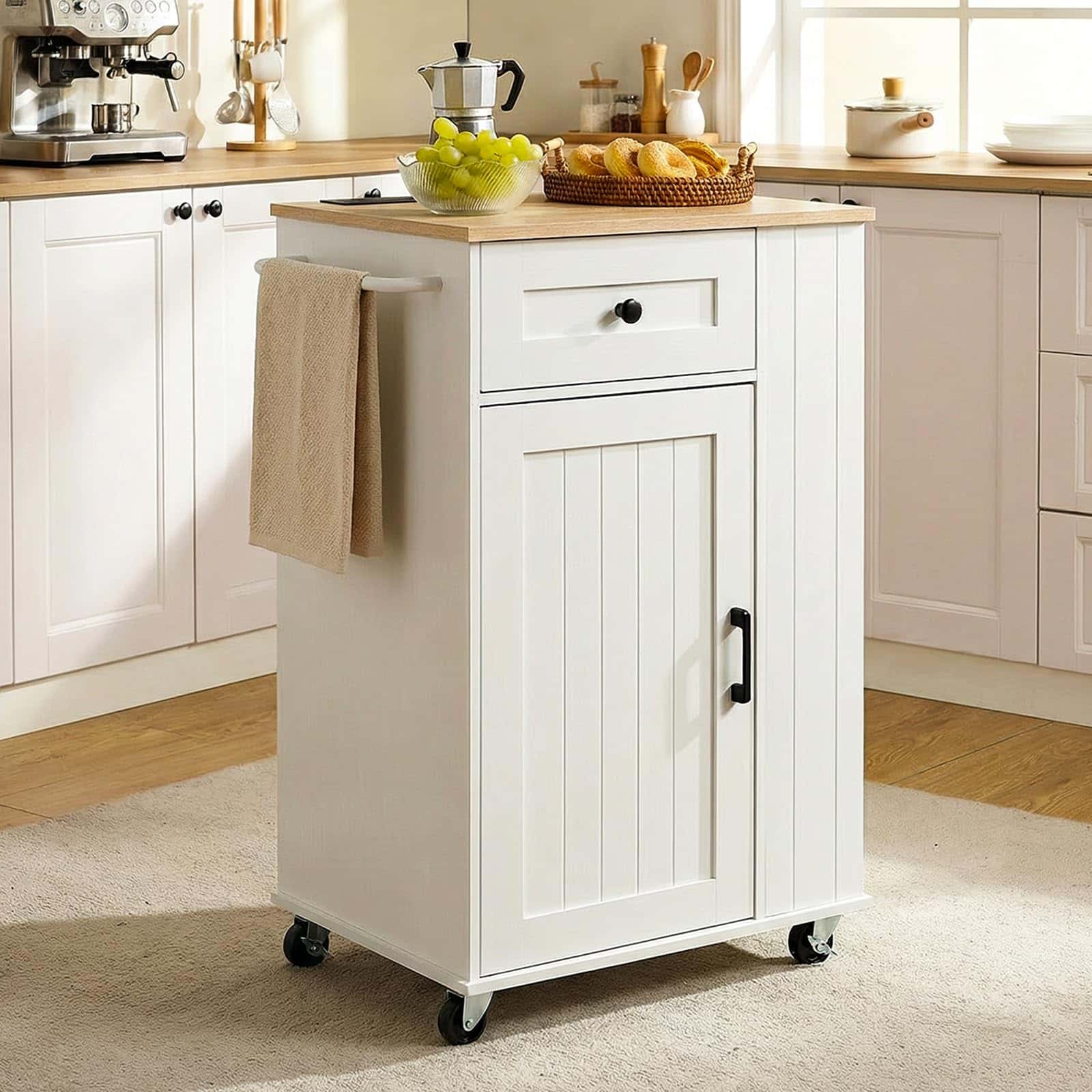 White kitchen island with a wooden top in a bright kitchen setting