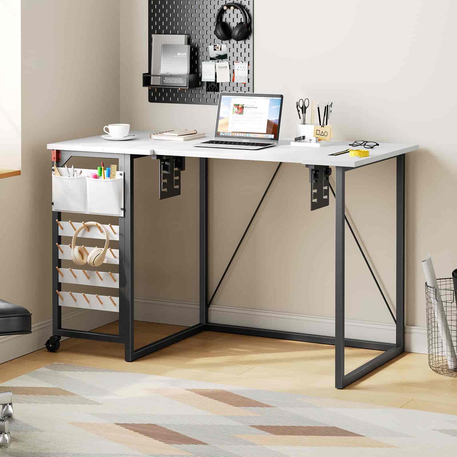 White L-shaped desk with black metal legs in a home office setting.