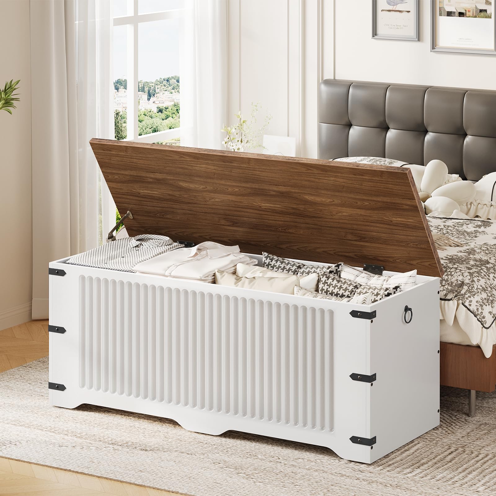 White storage bench with wooden lid in a bedroom setting