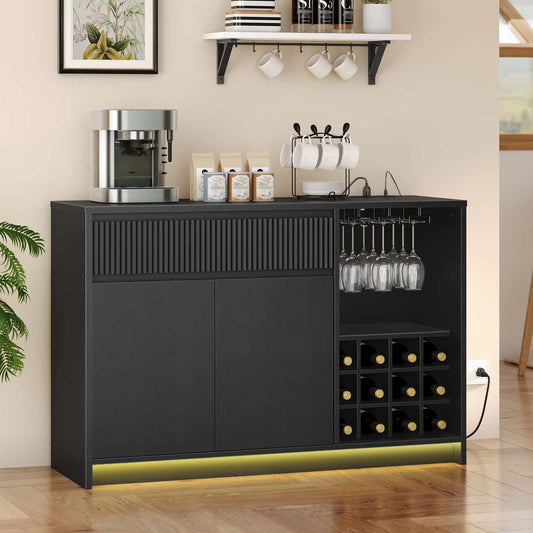Black bar cabinet with wine storage and coffee-making equipment in a home setting.