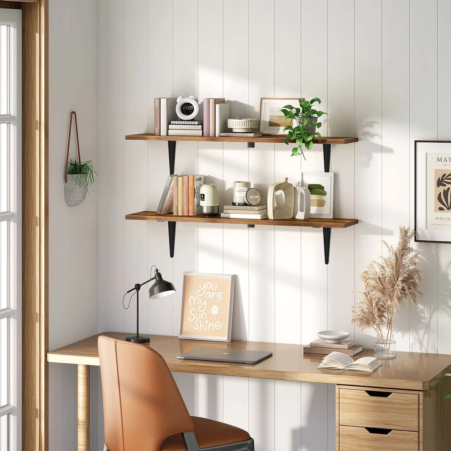 Home office setup with a desk, chair, shelves, and decorative items.
