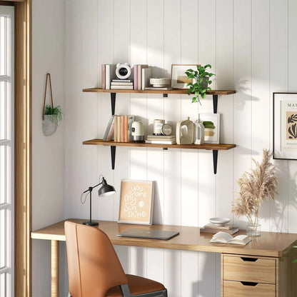 Home office setup with a desk, chair, shelves, and decorative items.