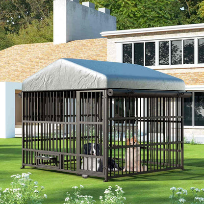 Large metal dog crate with a cover on a grassy area in front of a building