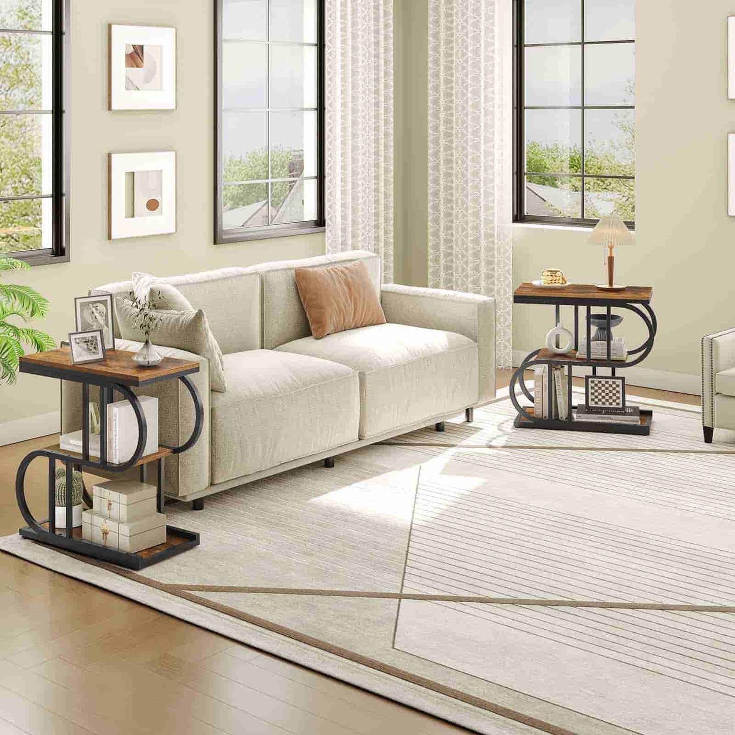 Modern living room with a beige sofa, side tables, and decorative items.