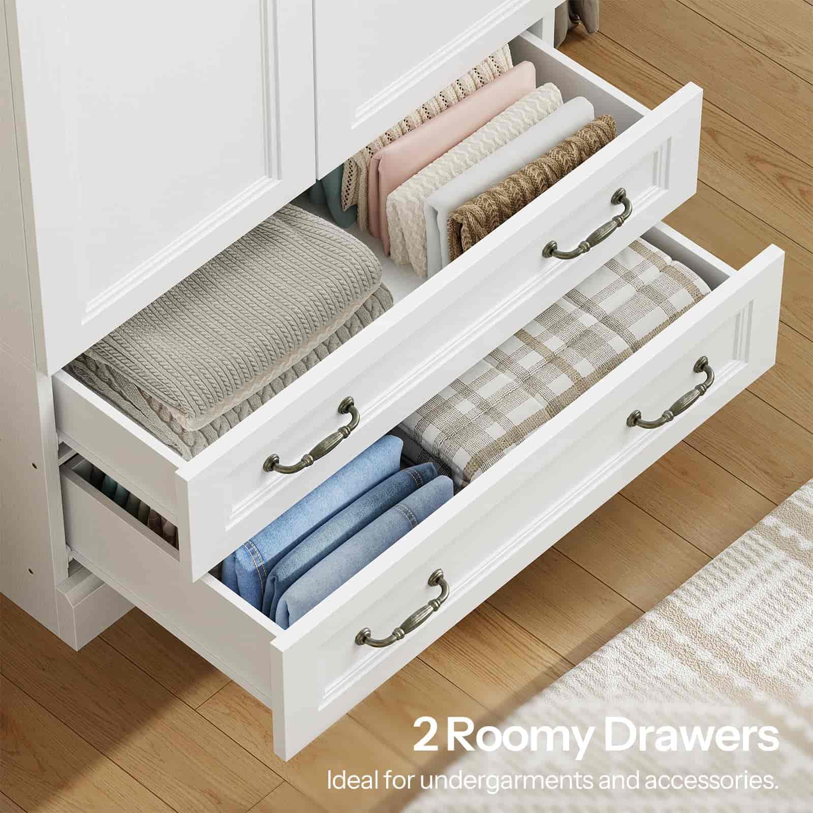 White wardrobe with open drawers containing folded clothes on a wooden floor.