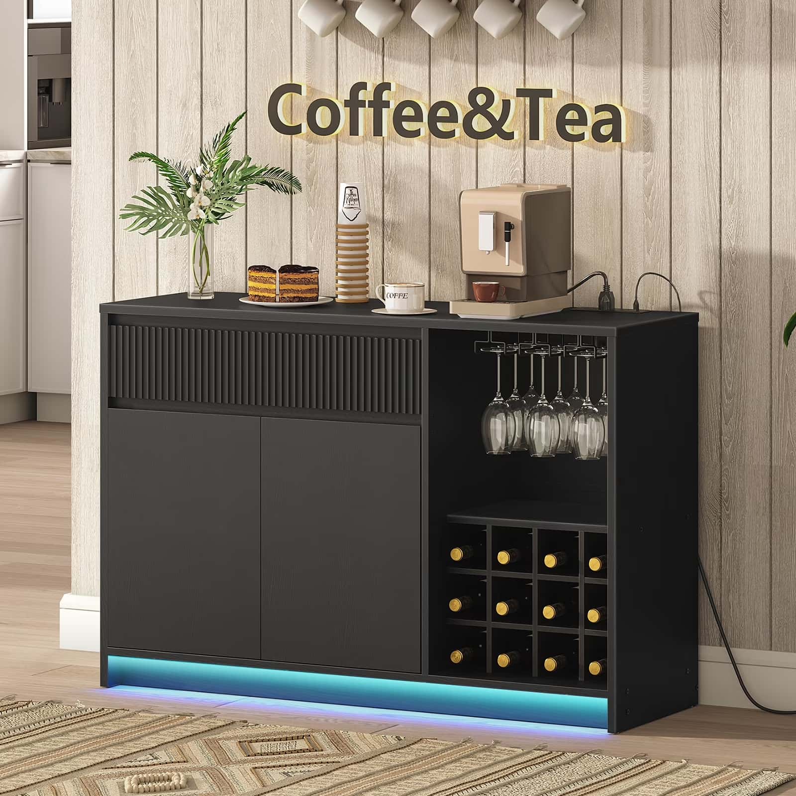 Black bar cabinet with coffee and tea station in a kitchen setting