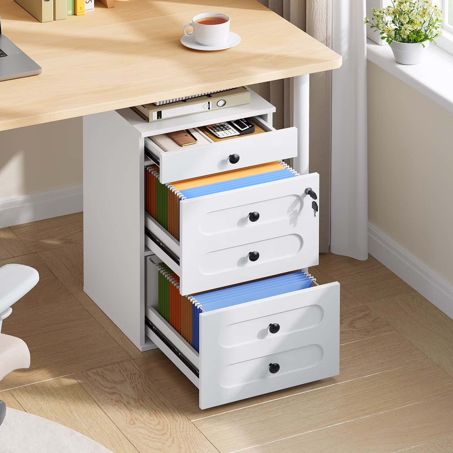 White storage cabinet with open drawers under a wooden desk.