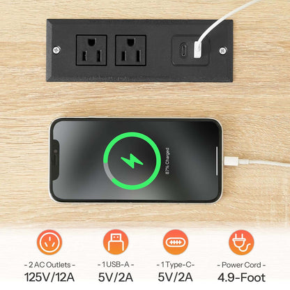 Power outlet with multiple ports and a smartphone charging on a wooden surface