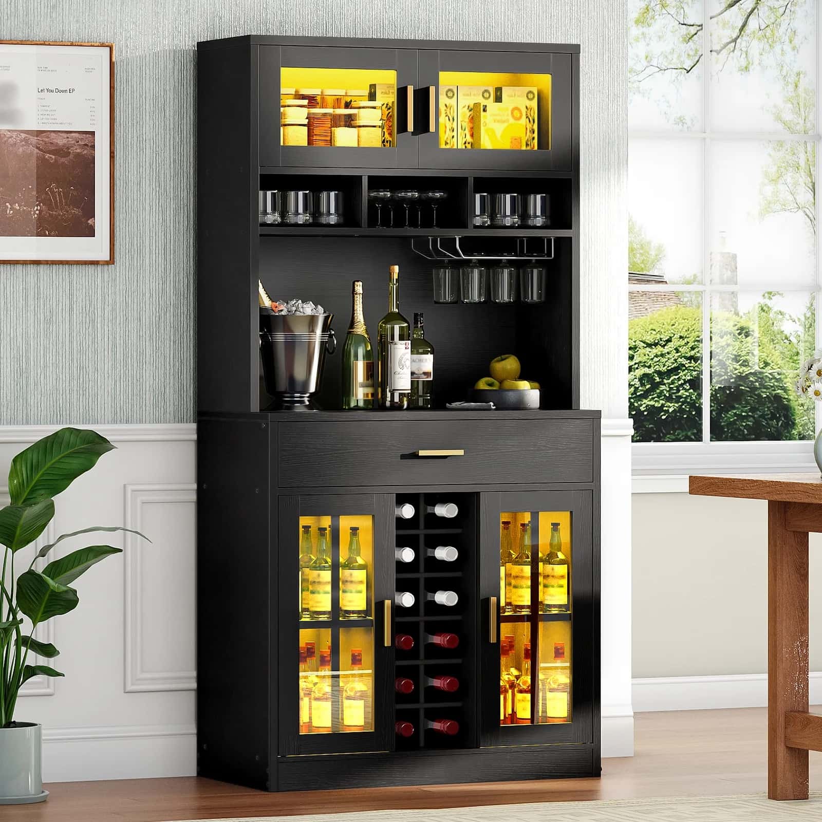 Black bar cabinet with illuminated shelves and wine storage in a home setting.